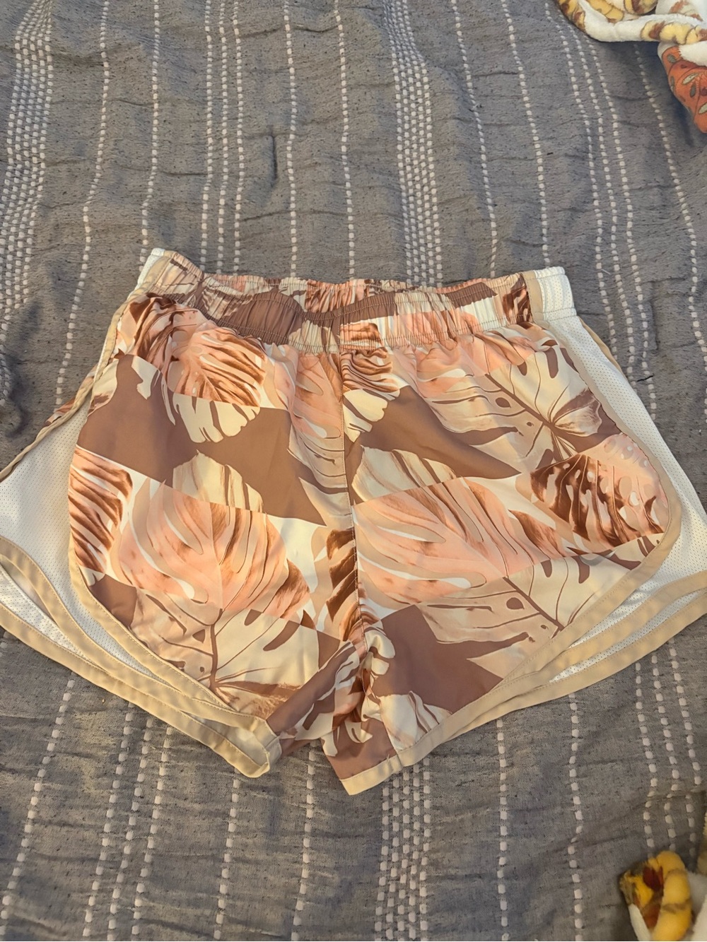 Nike Peach and Cream Tropical Leaf Athletic Shorts